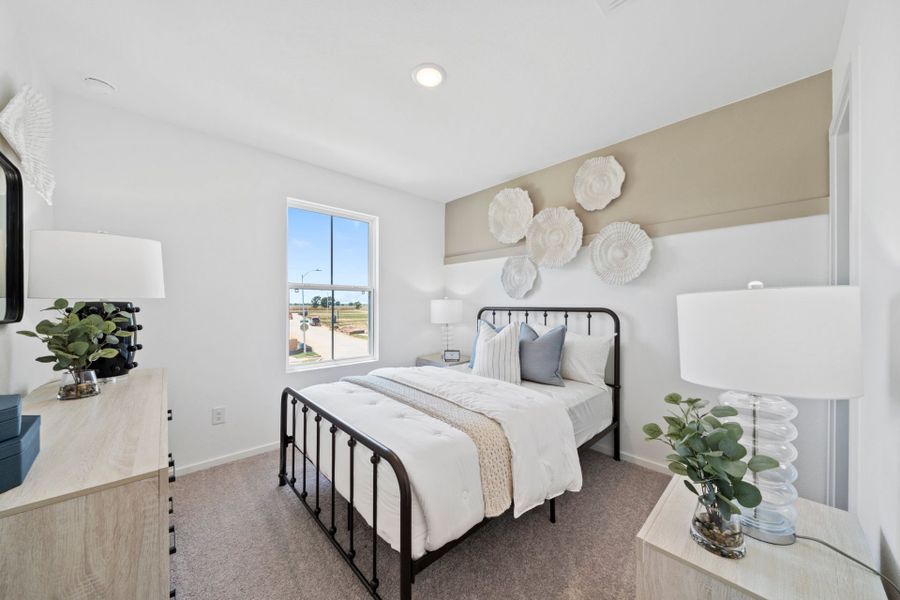 Furnished interior in a model home at The Courtyards at Stokesbury in Waller (Image 8). Furnished interior in a model home at The Courtyards at Stokesbury in Waller (Image 8).