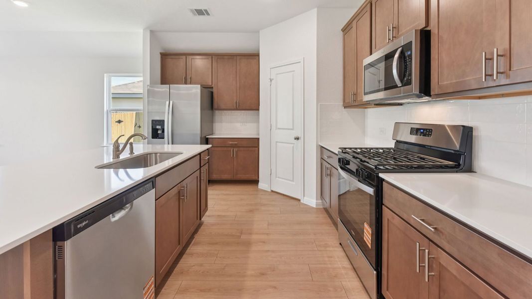 Furnished interior in a model home at Carillon in Manor (Image 6).