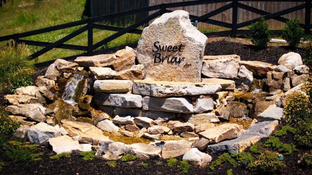 Entrance to the Sweet Briar community in Ooltewah, TN, featuring signage and landscaping (Image 2). Entrance to the Sweet Briar community in Ooltewah, TN, featuring signage and landscaping (Image 2).