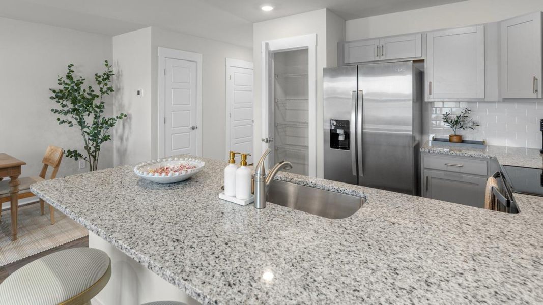 Furnished interior in a model home at The Landing at Sidbury Station in Castle Hayne (Image 22).