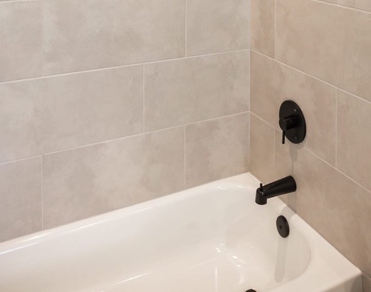 Furnished interior in a model home at Callan Village in San Antonio (Image 20).