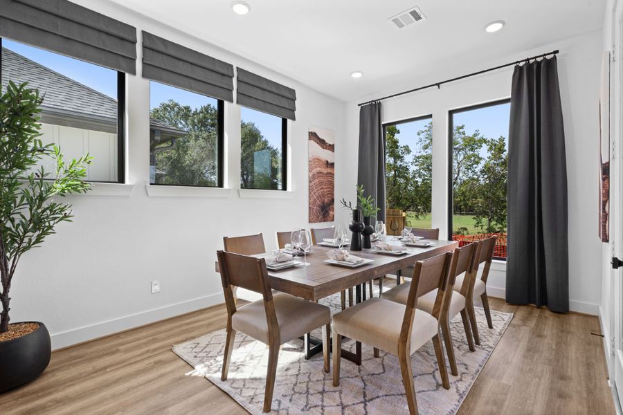Furnished interior in a model home at Hunters Crossing in Sealy (Image 7).