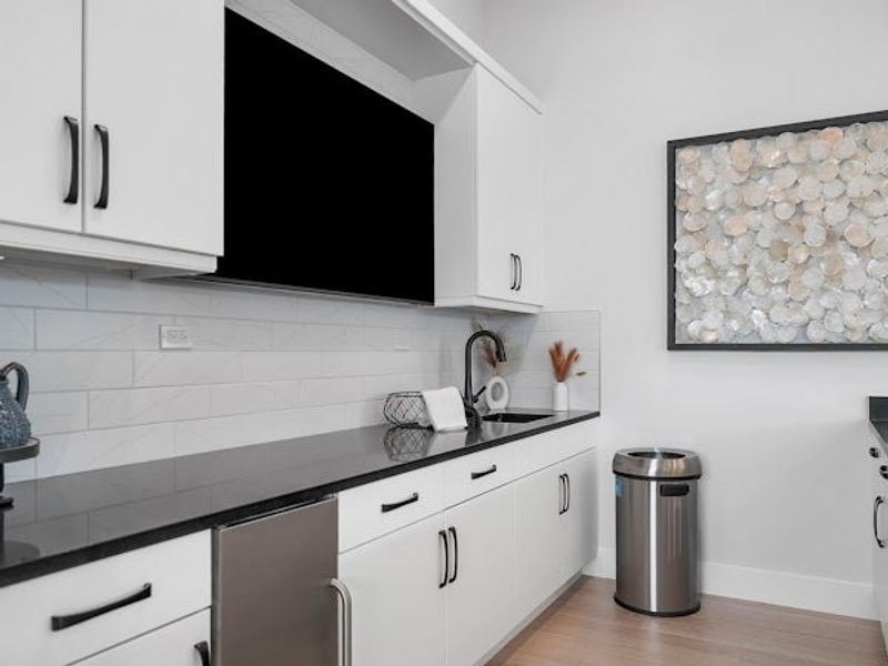 Furnished interior in a model home at High Pointe in Vero Beach (Image 85).