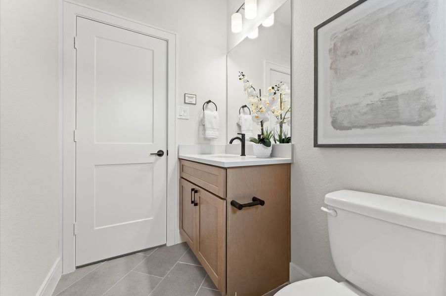 Furnished interior in a model home at Highland Gardens in Houston (Image 30).