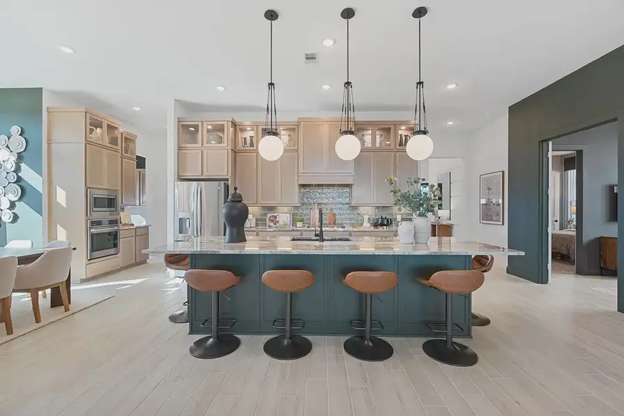 Furnished interior in a model home at Brookewater 60's in Rosenberg (Image 22).