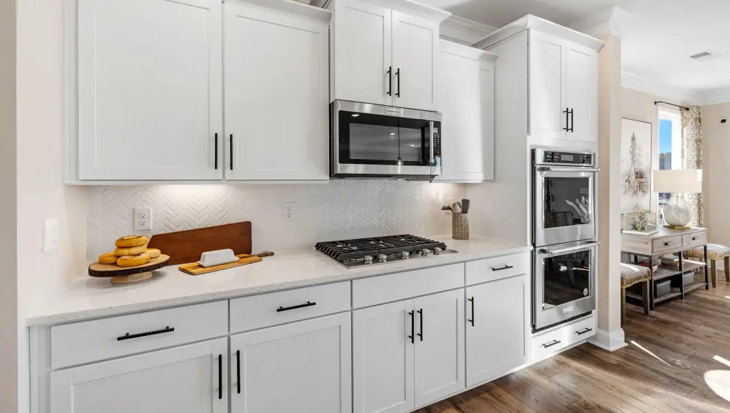Furnished interior in a model home at North Highway 101 in Greer (Image 7).