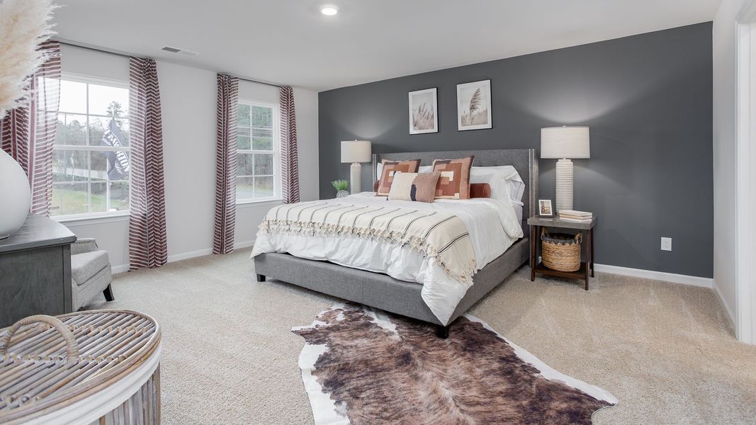 Furnished interior in a model home at Preston Oaks in King (Image 24).