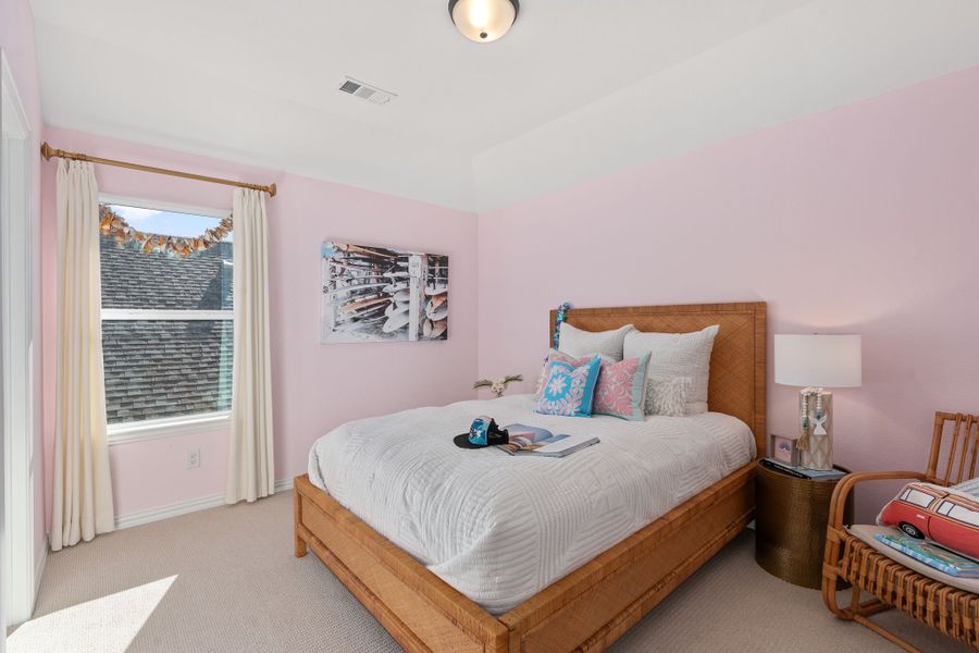 Furnished interior in a model home at Sweetgrass 50s in Haslet (Image 37).