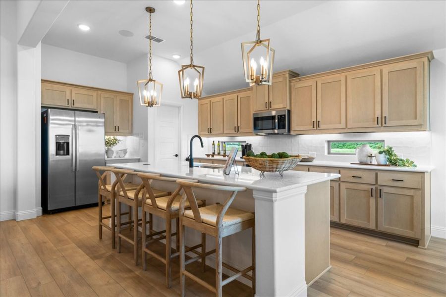 Furnished interior in a model home at River Ranch in Van Alstyne (Image 4).