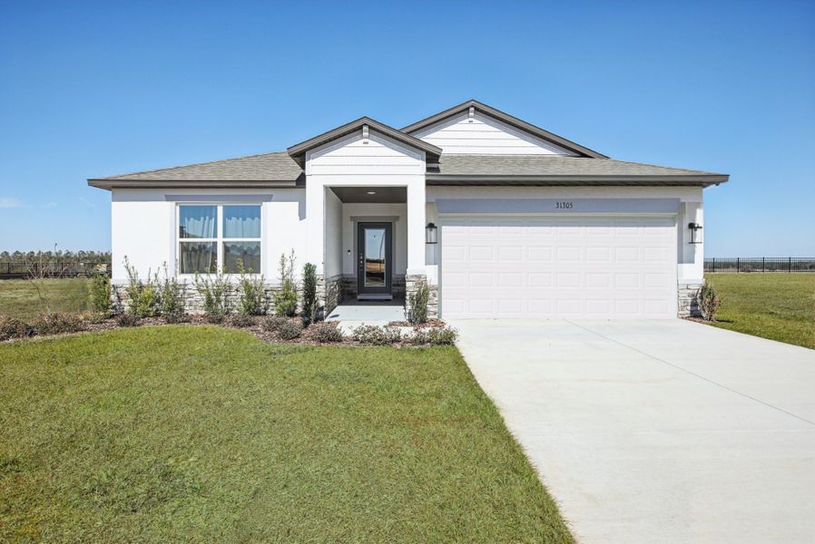 Front exterior of a home in the Benton Hills community, located in Brooksville, FL (Image 3).