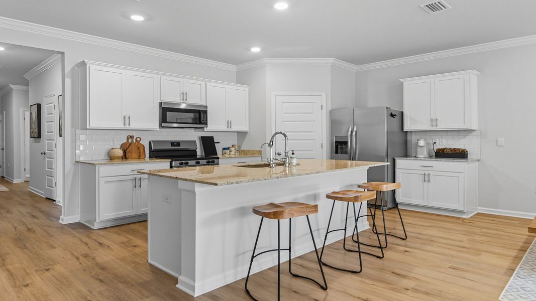 Furnished interior in a model home at Misting Springs in Crawfordville (Image 5).