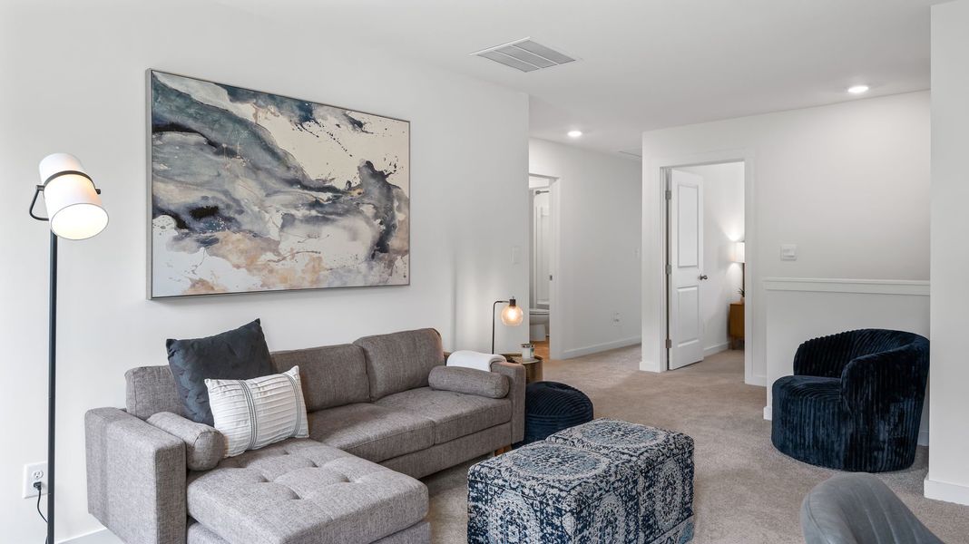 Furnished interior in a model home at Lone Oaks Farm in Cleveland (Image 31).