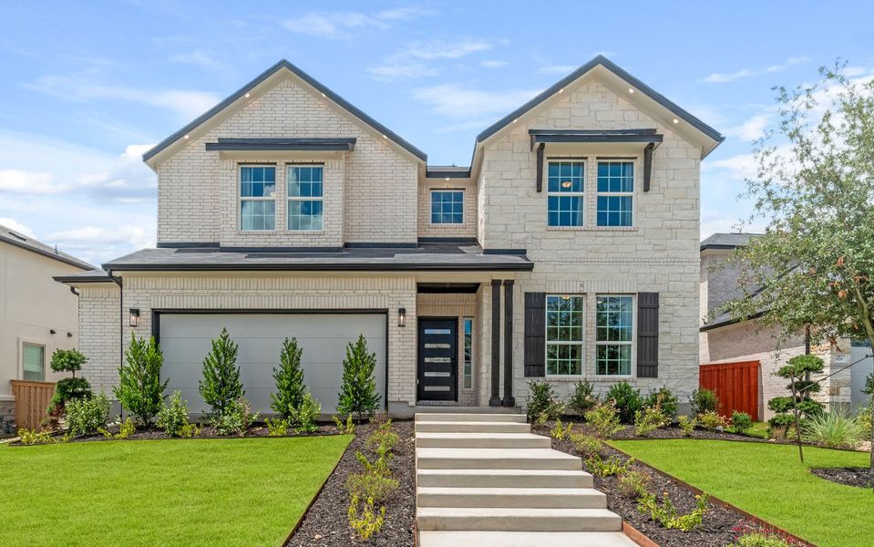Front exterior of a home in the Sunfield community, located in Buda, TX (Image 4).