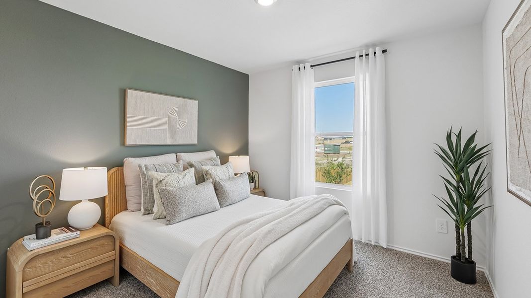 Furnished interior in a model home at Marigold in Kyle (Image 28).