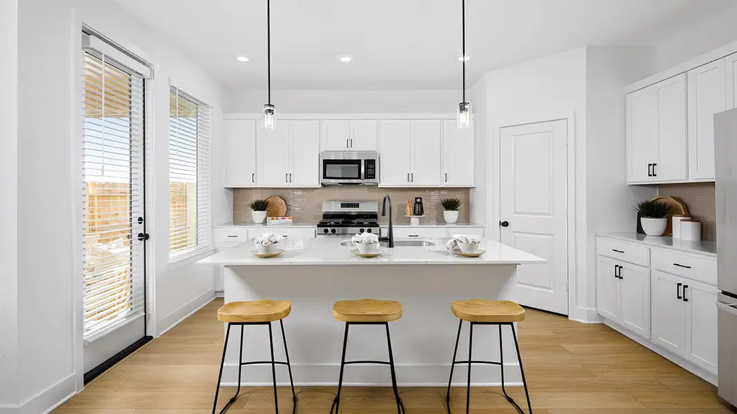 Furnished interior in a model home at The Canopies in Splendora (Image 6).