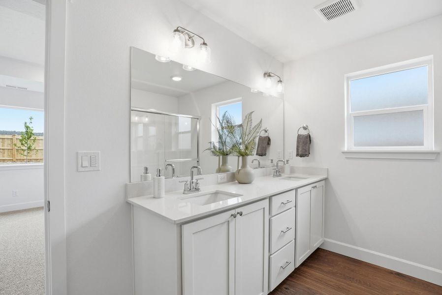 Furnished interior in a model home at IronHorse in Prineville (Image 11).