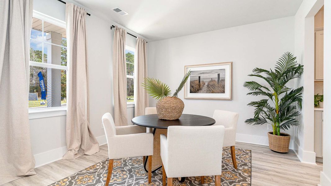 Furnished interior in a model home at Heron Pointe in Myrtle Beach (Image 14).