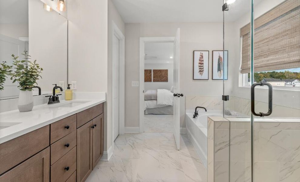 Furnished interior in a model home at Enclave at Riverdale in Huntersville (Image 11).