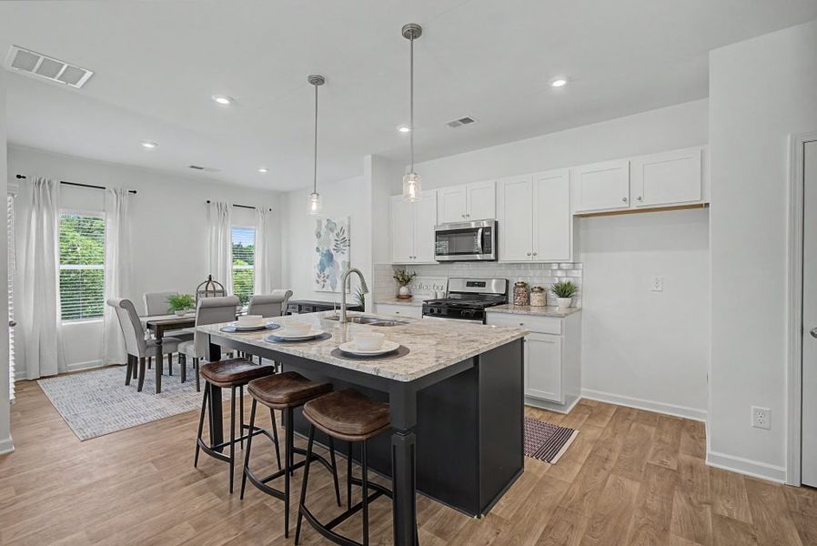 Furnished interior in a model home at The View at Groover’s Lake in Lithia Springs (Image 6).