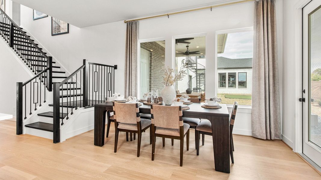 Furnished interior in a model home at Bridgeland Central in Cypress (Image 30).