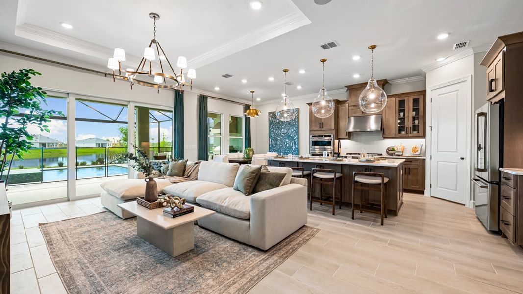 Furnished interior in a model home at Esplanade at McKinnon Groves in Winter Garden (Image 3).