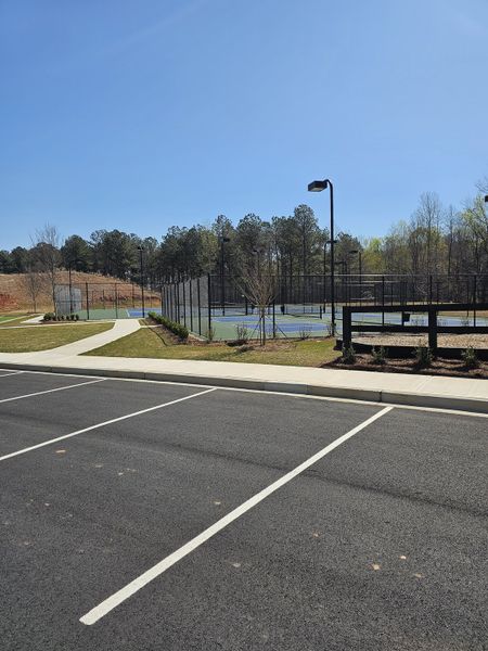 A modern community park with tennis courts in Braselton Village by D.R. Horton, Braselton, GA.