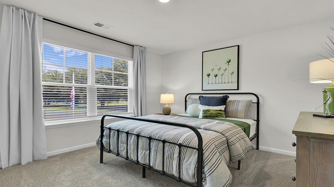 Furnished interior in a model home at The Cove at Mallard Crossing in Summerville (Image 6).