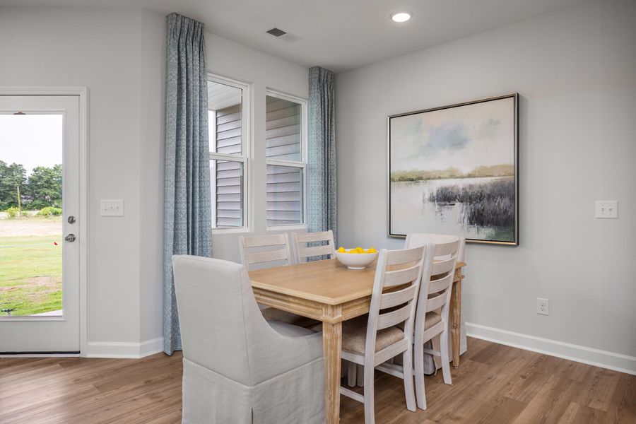 Furnished interior in a model home at Gregory Village Townhomes in Lillington (Image 27).