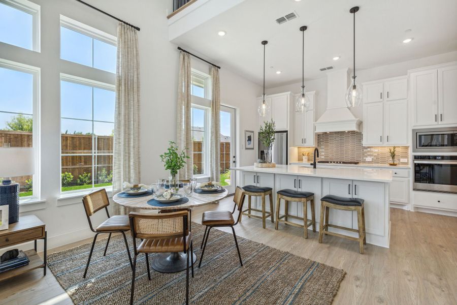Furnished interior in a model home at Newman Village Townhomes in Frisco (Image 8).