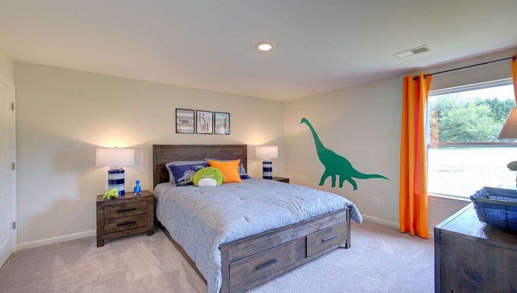 Furnished interior in a model home at Tap Root Farms in Fletcher (Image 27).