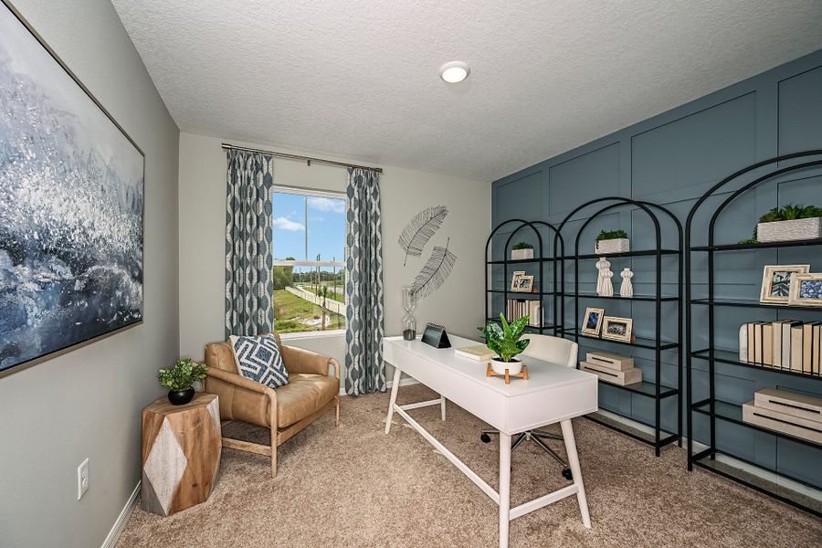 Furnished interior in a model home at Bradbury Creek in Haines City (Image 7).