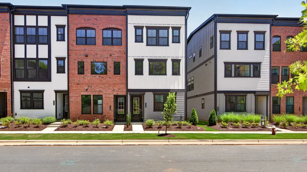 Condo located in Old Town Village, Waxhaw, highlighting architectural design (Image 3).