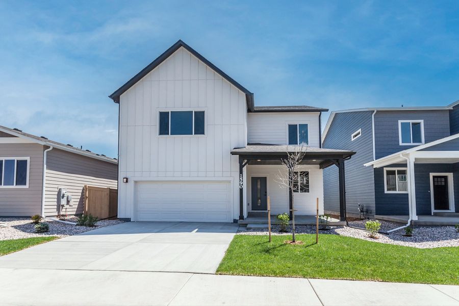 Front exterior of a home in the Granary Trailblazer Collection - Single Family Homes community, located in Johnstown, CO (Image 5). Front exterior of a home in the Granary Trailblazer Collection - Single Family Homes community, located in Johnstown, CO (Image 5).