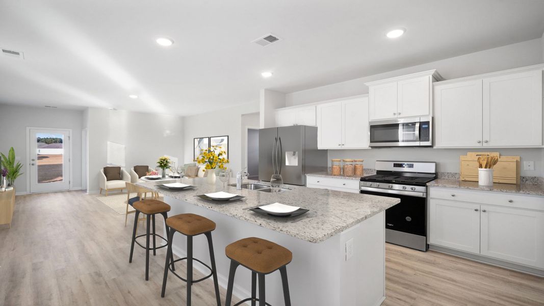 Furnished interior in a model home at The Groves at Bees Creek in Ridgeland (Image 19).