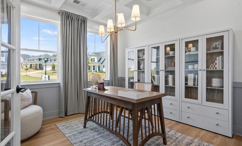 Furnished interior in a model home at The Enclave at Hidden Lake - 55+ Community in Youngsville (Image 5).