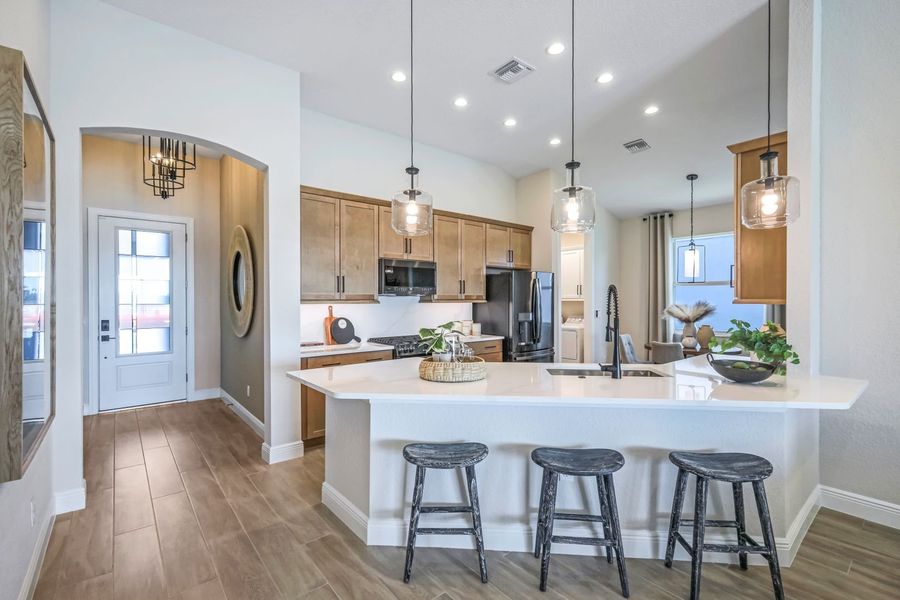 Furnished interior in a model home at The Sanctuary – Resort Collection in Punta Gorda (Image 9).