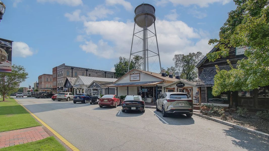 Front exterior of a home in the Saddleridge community, located in Senoia, GA (Image 9). Front exterior of a home in the Saddleridge community, located in Senoia, GA (Image 9).