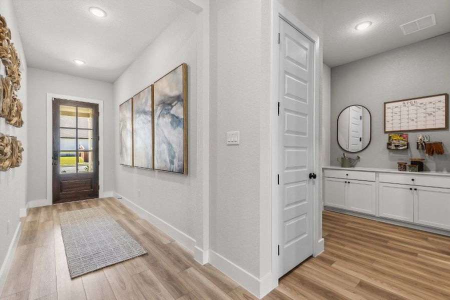 A white room with a rug and a rug.