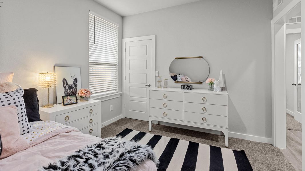 Furnished interior in a model home at Northwest Passage in Midland (Image 17). Furnished interior in a model home at Northwest Passage in Midland (Image 17).