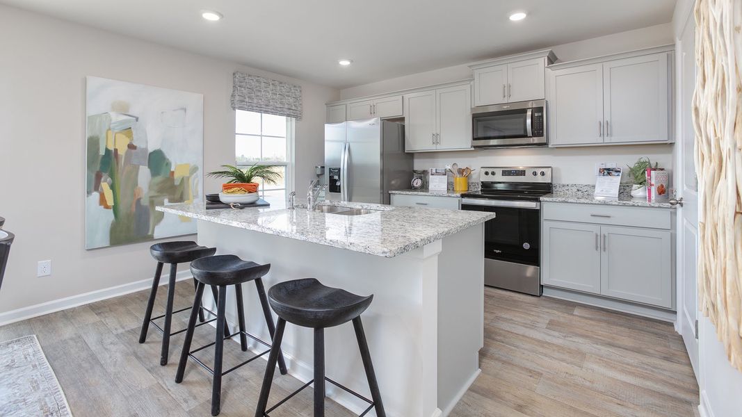 Furnished interior in a model home at Edinborough in Gibsonville (Image 6).