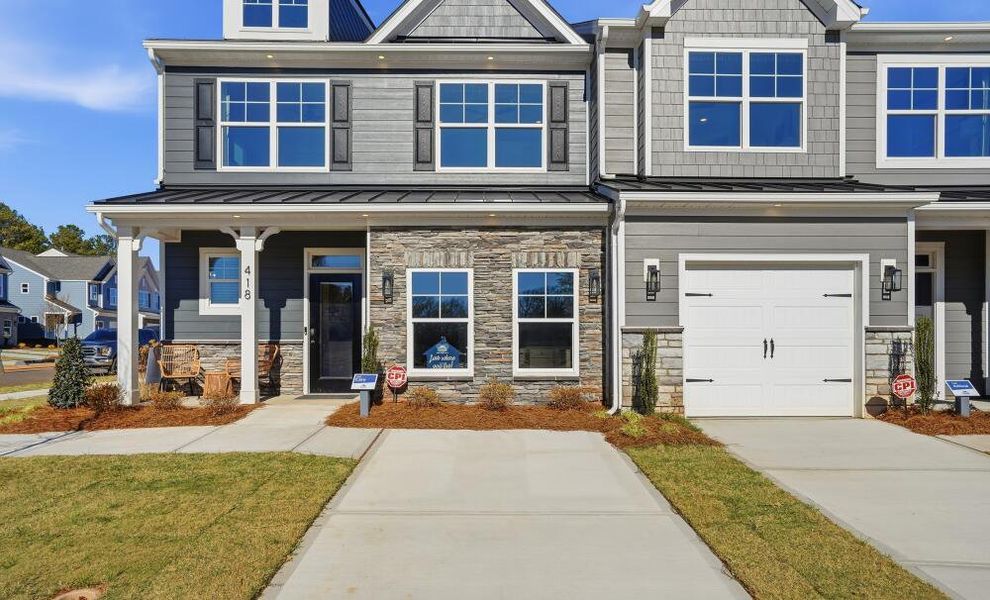 Front exterior of a home in the Blythe Mill Townhomes community, located in Waxhaw, NC (Image 11). Front exterior of a home in the Blythe Mill Townhomes community, located in Waxhaw, NC (Image 11).