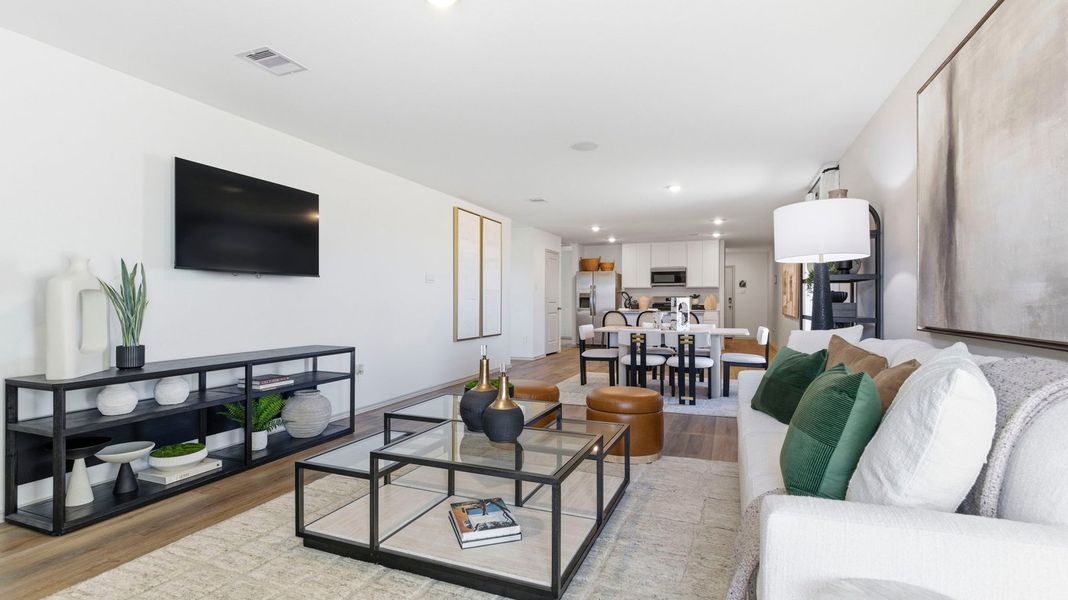 Furnished interior in a model home at Watermark in Alvin (Image 11).