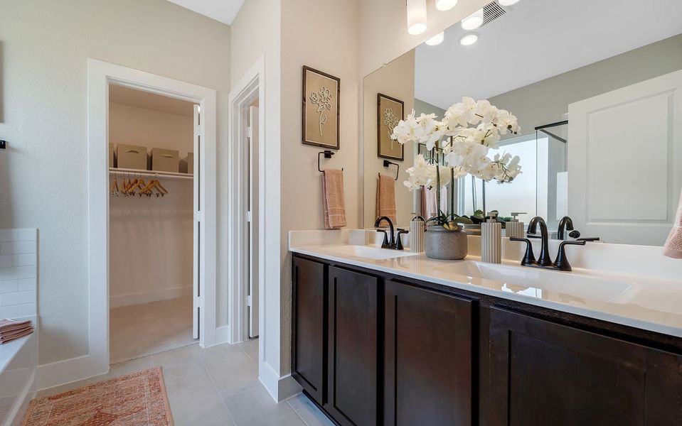 Furnished interior in a model home at Harvest Pointe in Needville (Image 19).