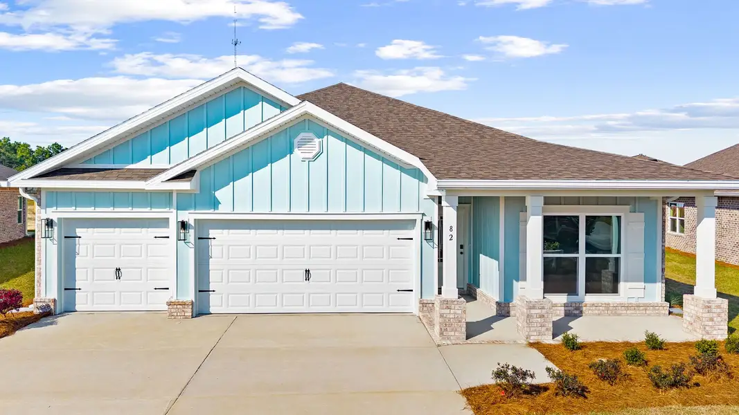Front exterior of a home in the Owl's Head Farms community, located in Freeport, FL (Image 4).