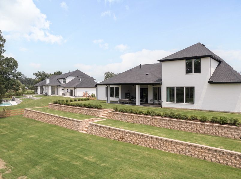 Front exterior of a home in the The Estates at James Lane community, located in Fulshear, TX (Image 10).