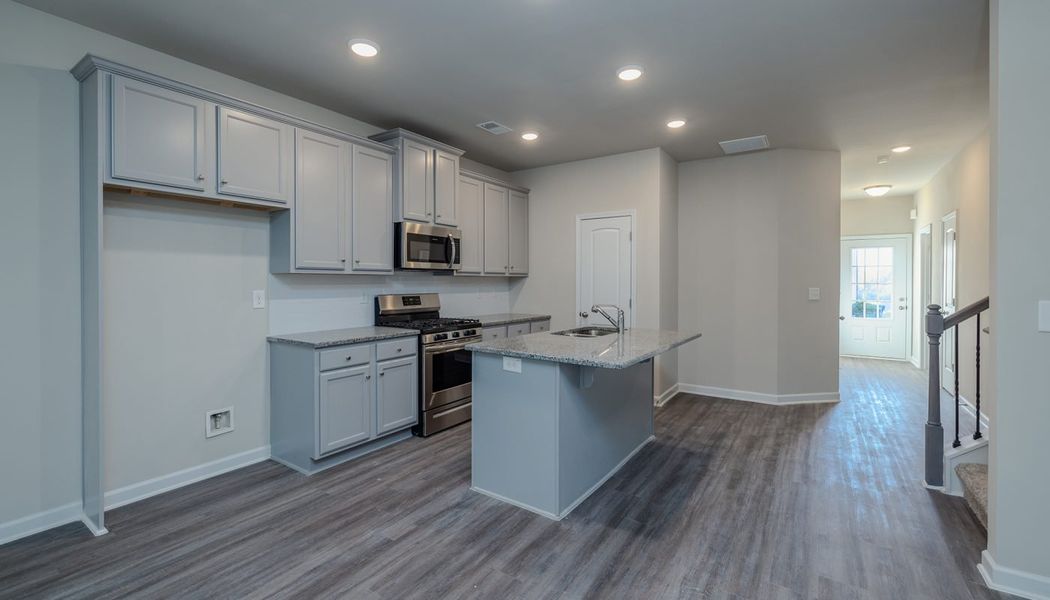 Furnished interior in a model home at The Reserve at Clocktower in Douglasville (Image 28).