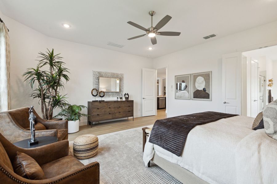 Furnished interior in a model home at Painted Tree Lakeside in McKinney (Image 42).