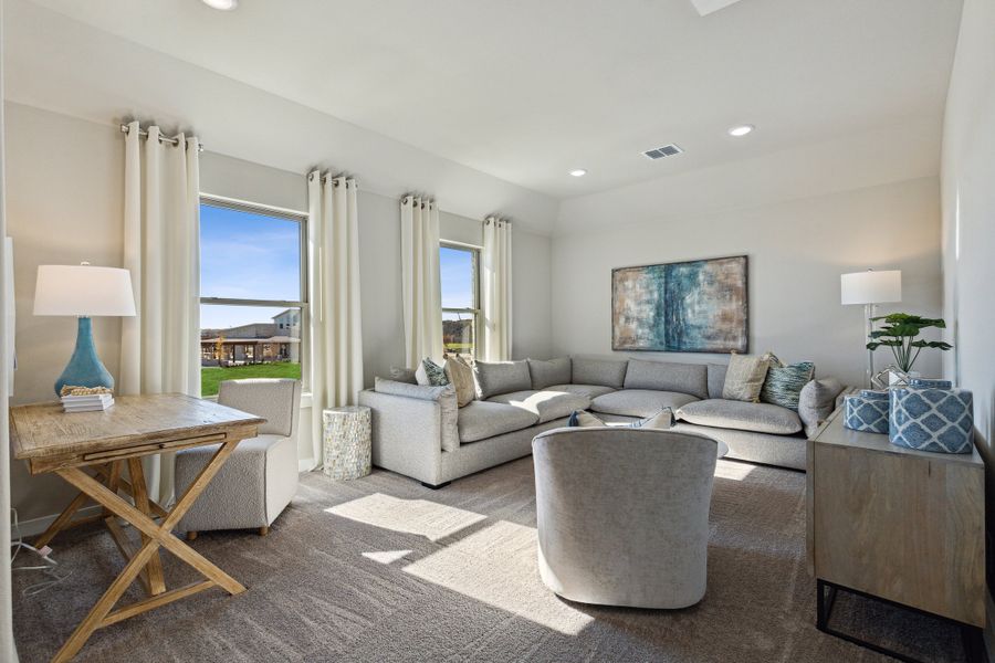 Game Room in an Oak Model Home by Trophy Signature Homes