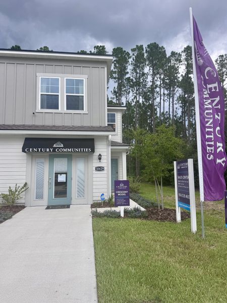 A modern model home with sleek siding in The Villas at Bishop Oaks by Century Communities (Jacksonville, FL).