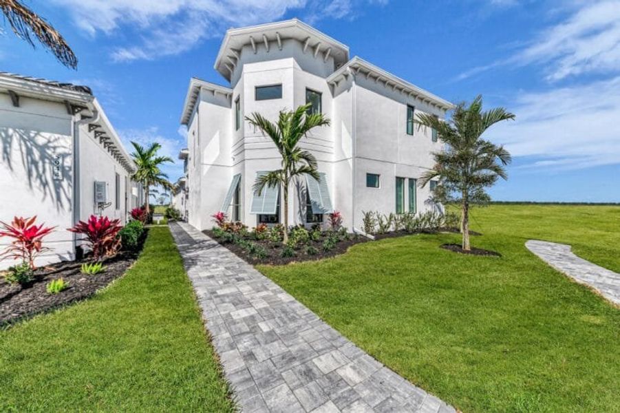 Front exterior of a home in the Aqua community, located in Bradenton, FL (Image 22). Front exterior of a home in the Aqua community, located in Bradenton, FL (Image 22).